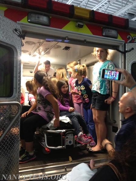 The Girl Scouts receiving a tour of the ambulance,
Photo: Nanuet EMS