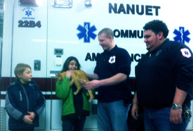 Lt. Grehl & Lt. Delgado returning the kitten found in the ambulance bays.  Photo: Nanuet EMS