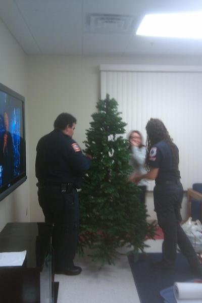 Decorating the Corp Christmas Tree 
Photo: Nanuet EMS